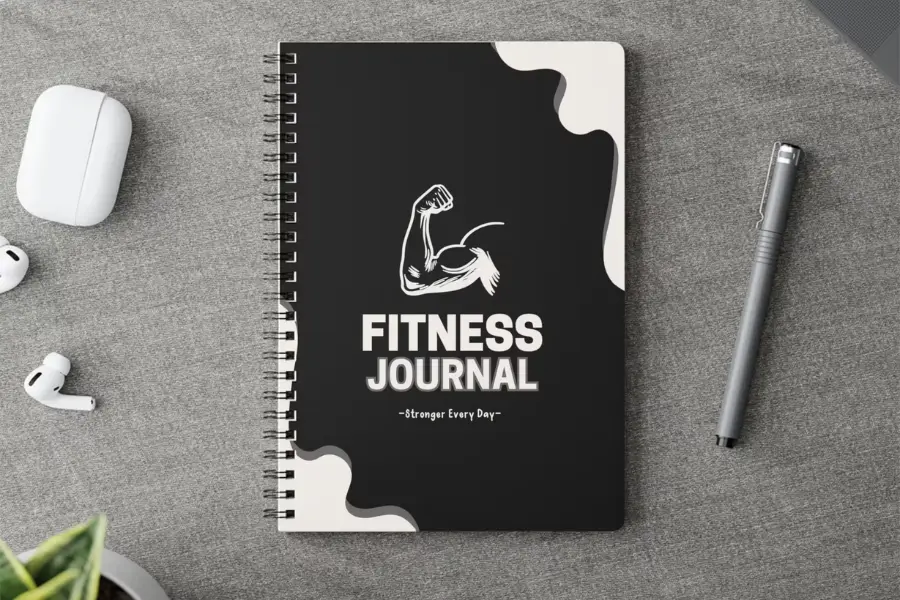 A fitness log journal will help your dad track his workouts