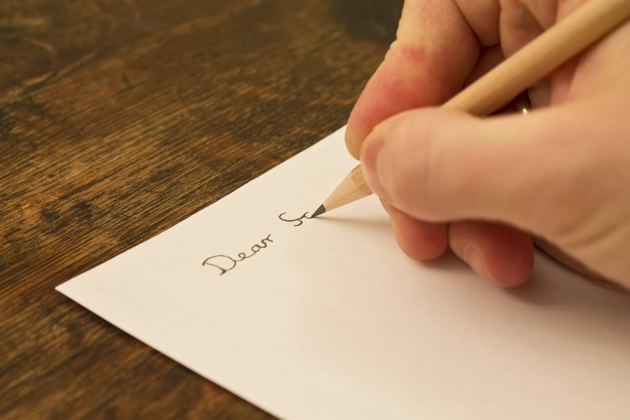 A handwritten letter will replace all words